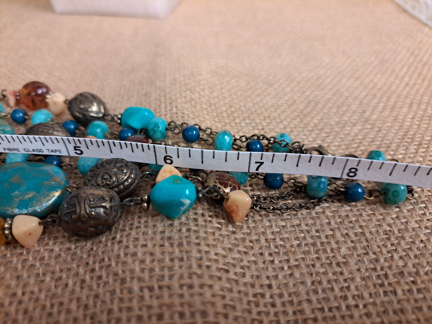 Turquoise colored stone necklace