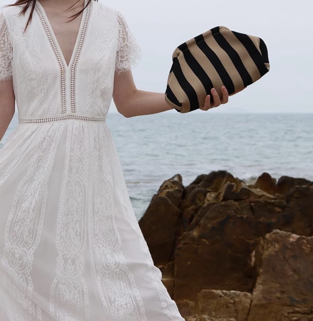 Small striped clutch